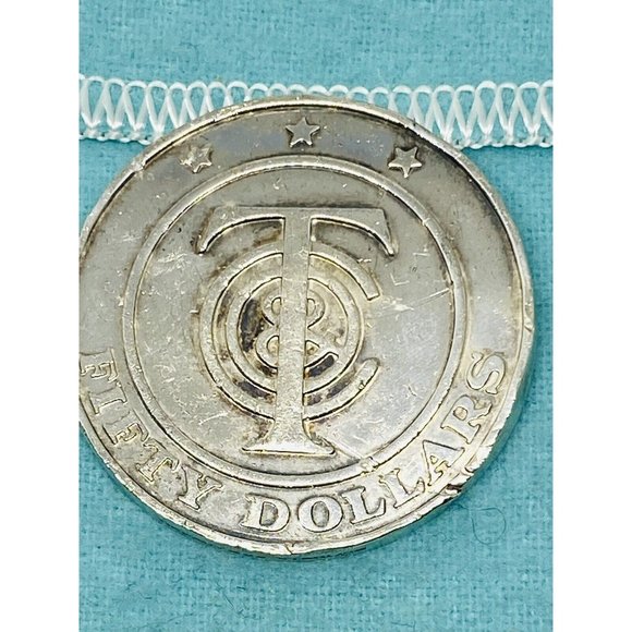 TIFFANY 50 DOLLAR SILVER MERCHANDISE COIN RETIRED See Pictures. 29.1 Grams
